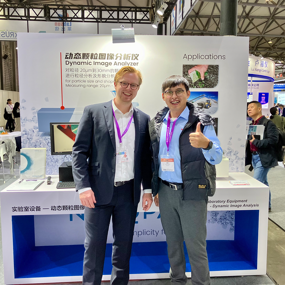 Senior Sales Specialist at NEXOPART, Bastian Driefer and representatives of the partner Labsun